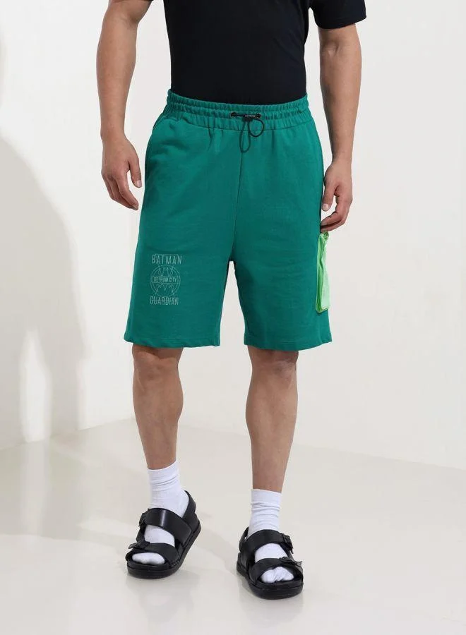 ذا انديان كراج كو Men Oversized Fit Batman Printed Side Pocket Mid-Rise Shorts